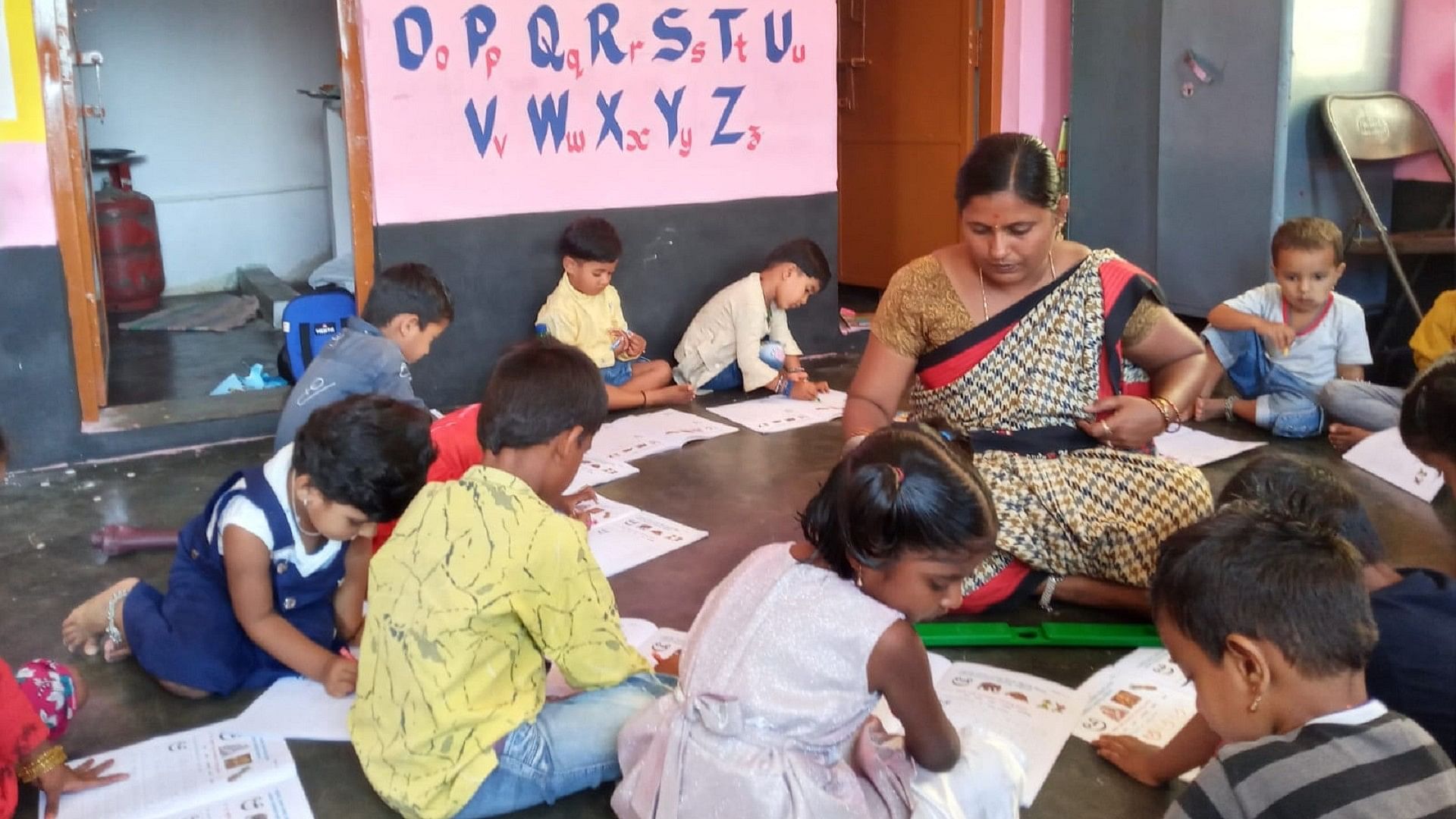<div class="paragraphs"><p>Children learning lessons in Anganwadi</p><p></p></div>