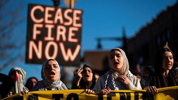 <div class="paragraphs"><p>Pro-Palestinian demonstrators march after taking part in a rally demanding a ceasefire and the end of Israel attacks on Gaza at the borough of Queens in New York, US.</p></div>