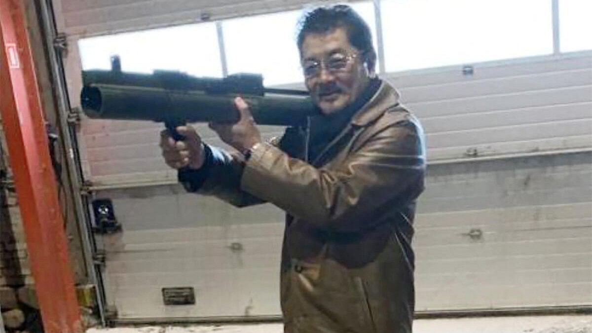 <div class="paragraphs"><p>Takeshi Ebisawa poses with a rocket launcher during a meeting with an informant at a warehouse in Copenhagen.</p></div>