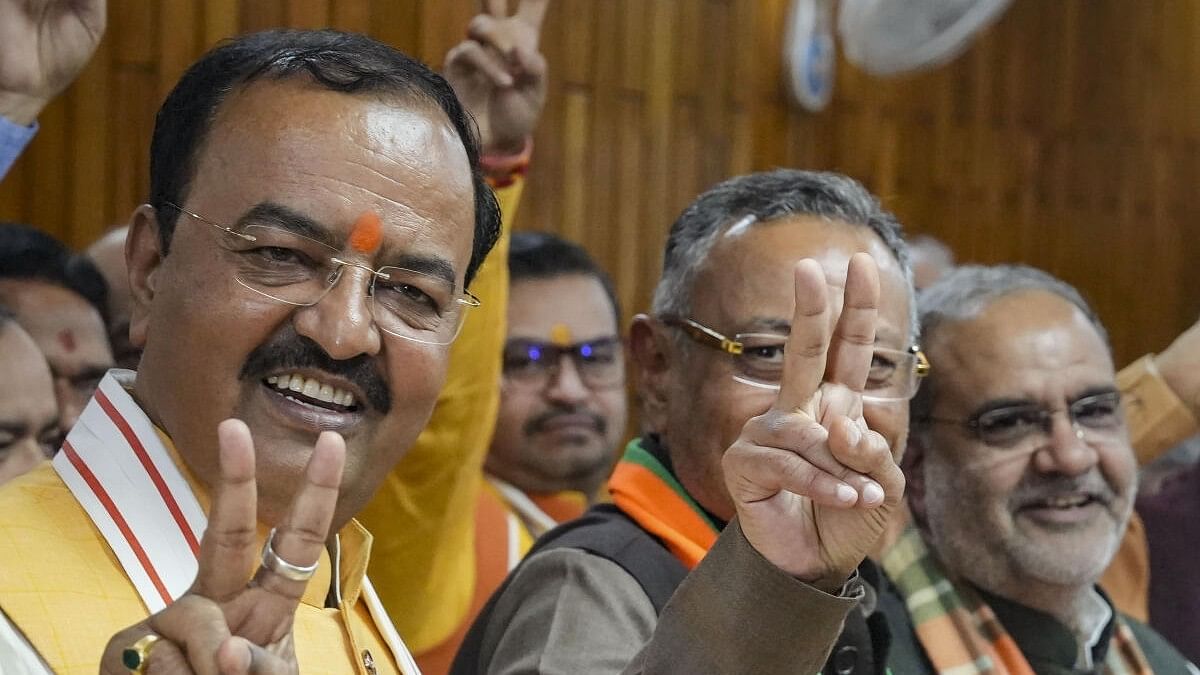 <div class="paragraphs"><p>BJP's Sanjay Seth with Deputy Chief Minister Keshav Prasad Maurya and BJP state president Bhupendra Chaudhary after filing the nominations.&nbsp;</p></div>