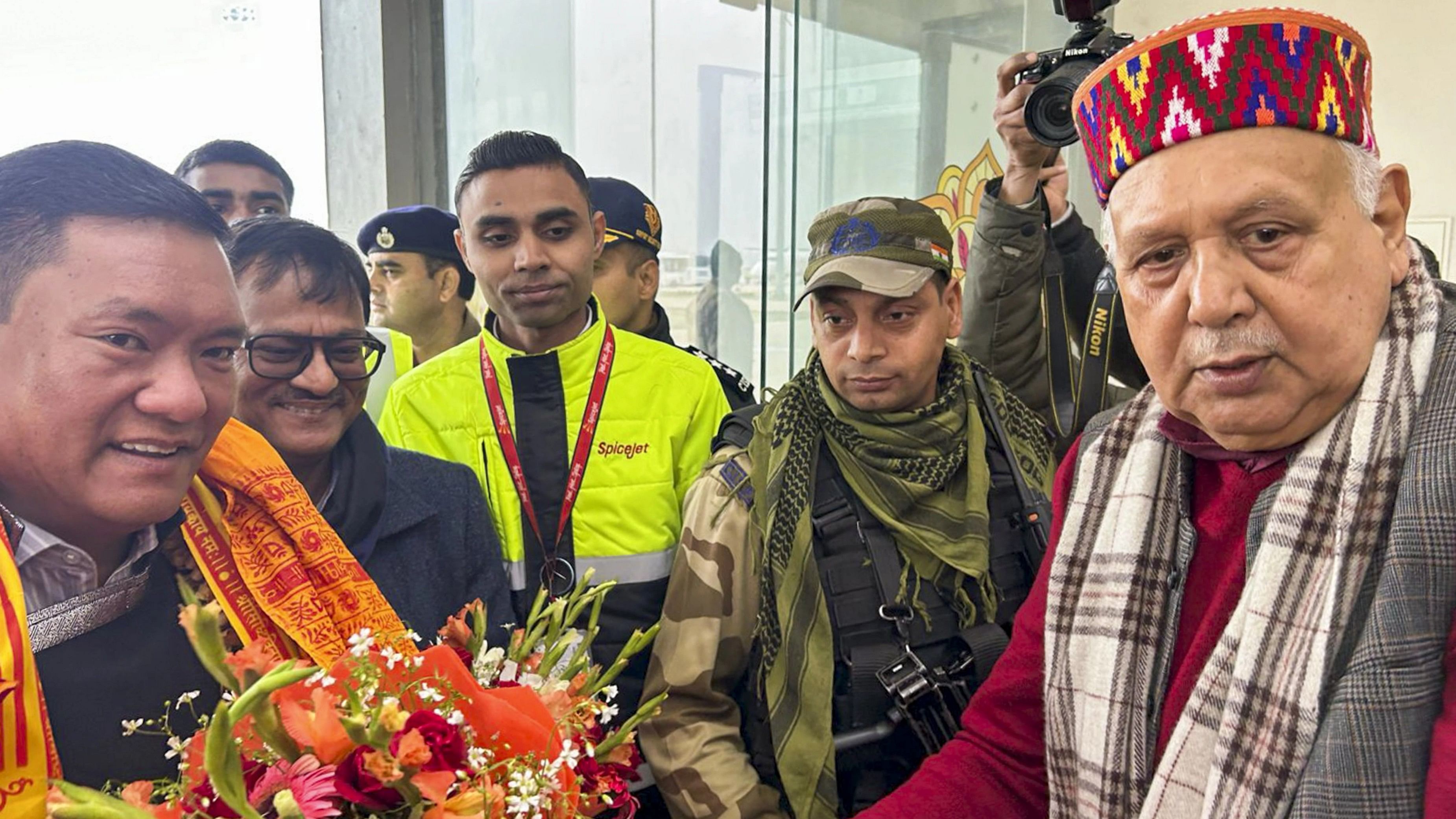 <div class="paragraphs"><p> Arunachal Pradesh Chief Minister Pema Khandu, accompanied by his cabinet colleagues and a delegation of 70 persons, being welcomed by BJP MLA SP Shahi on his arrival at at the Maharshi Valmiki airport to offer prayers at the Ram Mandir, in Ayodhya, Tuesday, February 6, 2024. </p></div>