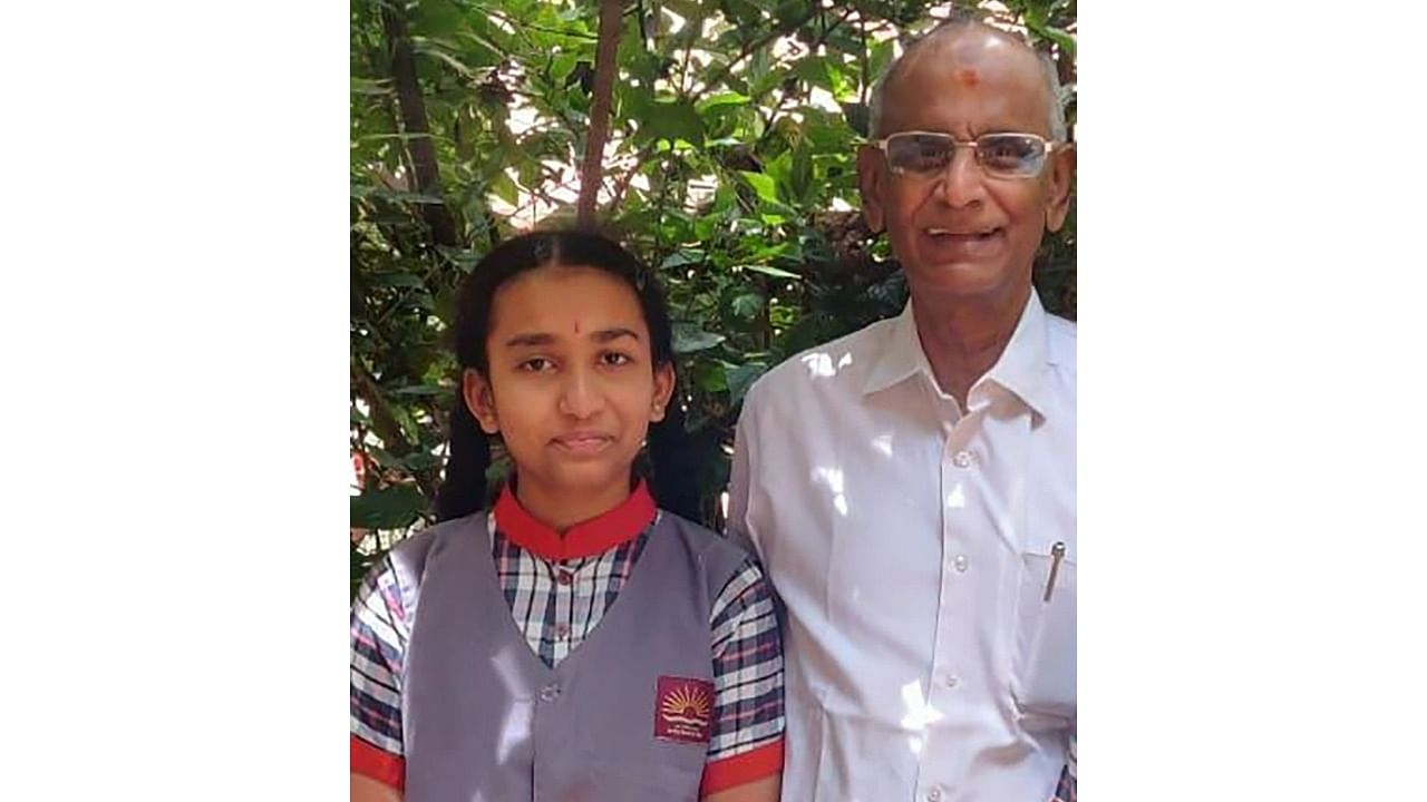 <div class="paragraphs"><p>Shraddha Vijay Raghavan with her grandfather V Babu Satyan.&nbsp;&nbsp;</p></div>