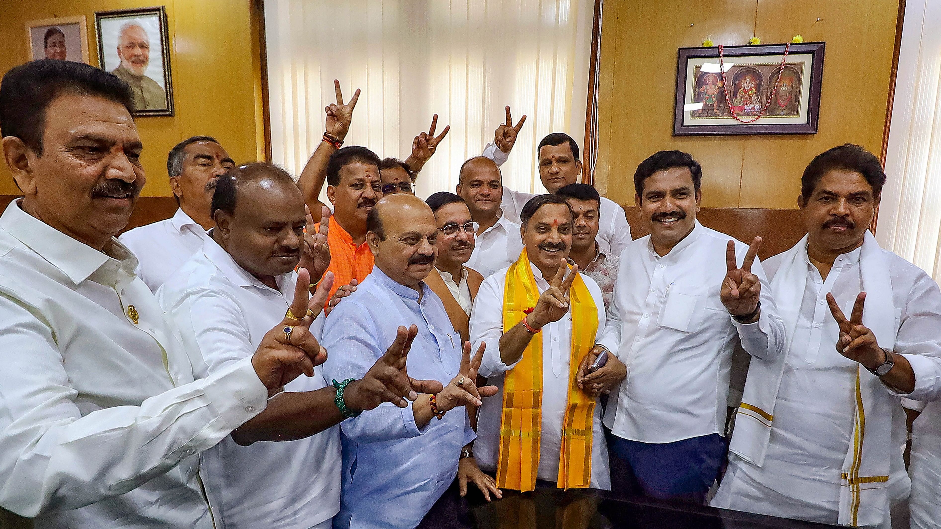 <div class="paragraphs"><p>Union Minister Pralhad Joshi with former Karnataka chief ministers Basavaraj Bommai and H.D. Kumaraswamy, and BJP candidate Narayana Bhandage during the voting for the Rajya Sabha elections, at the Vidhana Soudha.</p></div>