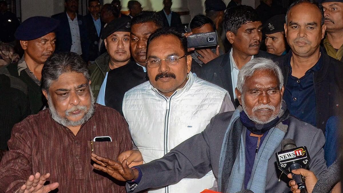 <div class="paragraphs"><p>JMM leader Champai Soren comes out from Raj Bhavan after a meeting with Jharkhand Governor C P Radhakrishnan to stake claim to form the government in the state, in Ranchi.&nbsp;</p></div>