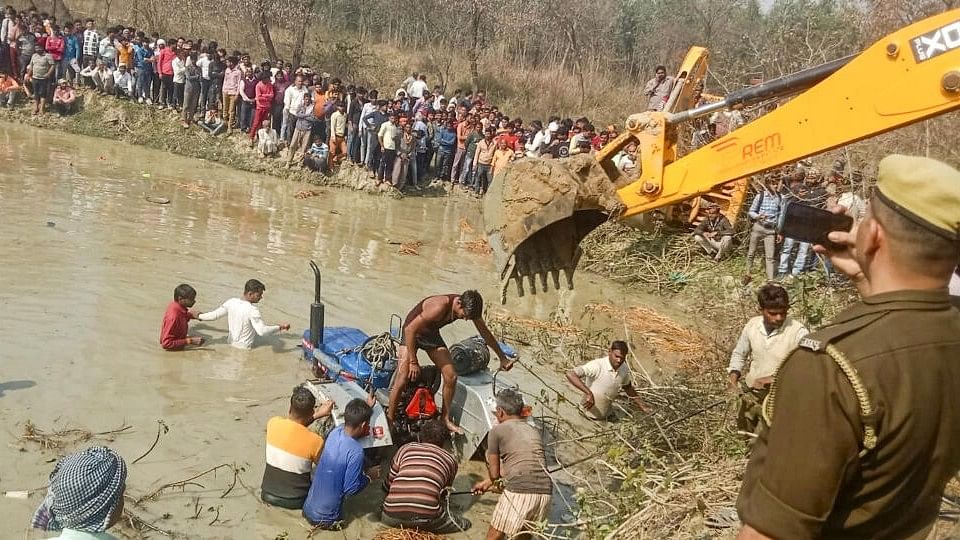 <div class="paragraphs"><p>Rescue operation underway at the pond where at least twenty-four people, including eight children, died when their tractor-trolley overturned and fell, in Kasganj, Saturday, Feb. 24, 2024.</p></div>