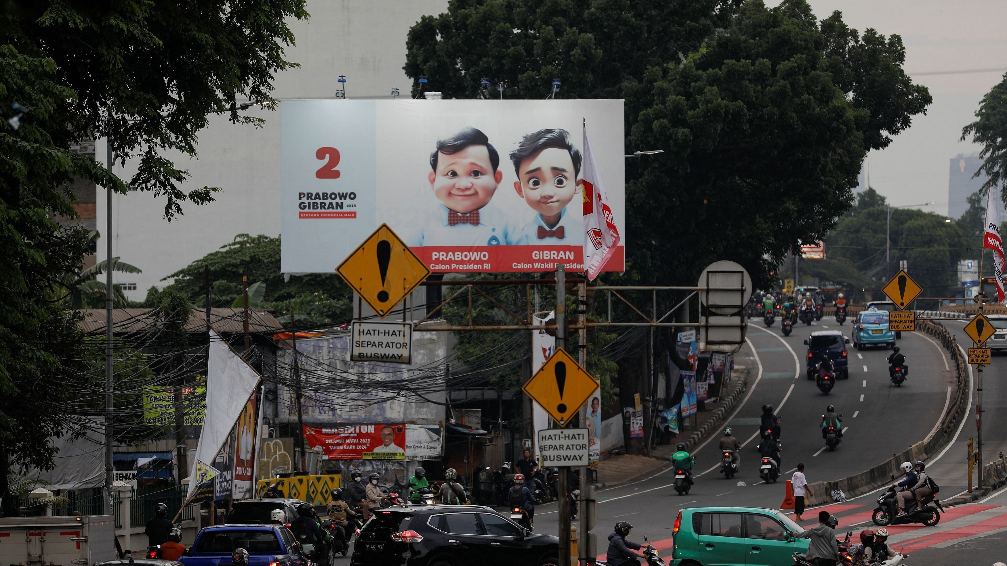 <div class="paragraphs"><p>A billboard promoting Indonesia's Defence Minister and Presidential candidate Prabowo Subianto and his running mate Gibran Rakabuming Raka in Jakarta.</p></div>