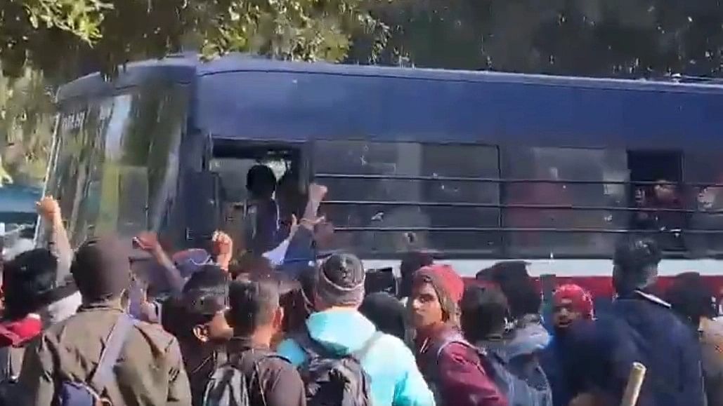 <div class="paragraphs"><p>A group of youth  protesting outside Vice President Jagdeep Dhankhar's official residence</p></div>