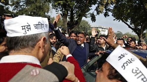 <div class="paragraphs"><p>A security personnel (C) tries to maintain order during a protest by (AAP) </p></div>