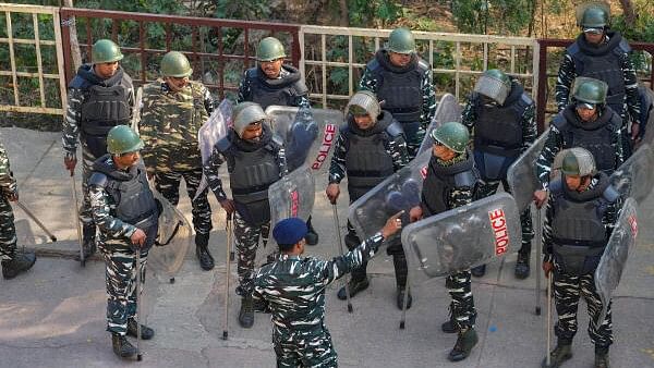 <div class="paragraphs"><p>Security personnel guard in view of farmers' 'Delhi Chalo' protest, in New Delhi&nbsp;to demand minimum crop prices.</p></div>