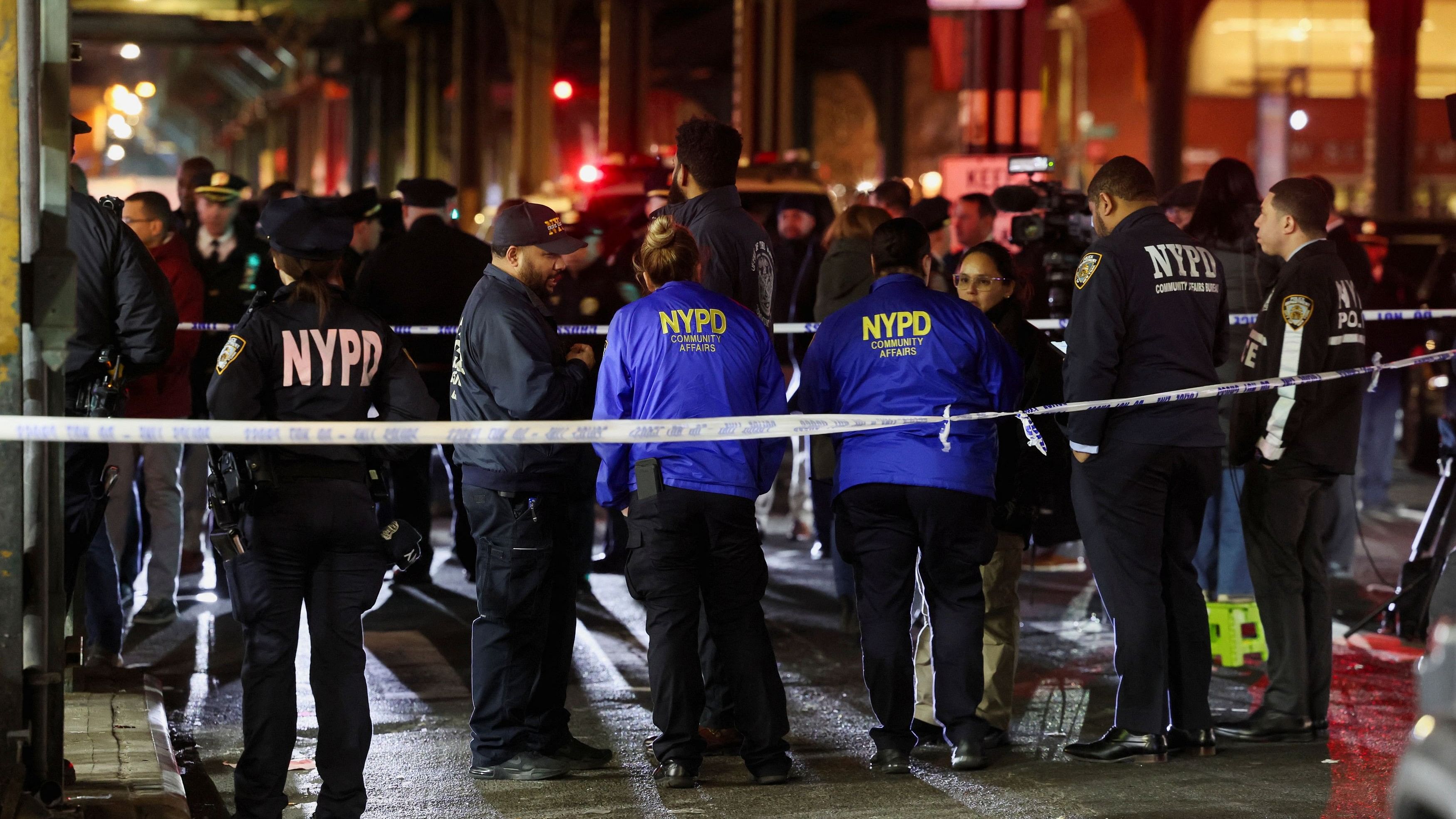 <div class="paragraphs"><p>Members of the New York Police Department (NYPD) investigate the scene of a shooting at the Mount Eden Avenue subway station in the Bronx borough of New York City, US.</p></div>