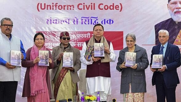 <div class="paragraphs"><p>Uttarakhand Chief Minister Pushkar Singh Dhami with retired Supreme Court judge Ranjana Prakash Desai and others at Chief Sevak Sadan, in Dehradun, Friday, Feb. 2, 2024. A state government-appointed five-member committee headed by Desai to prepare a draft of the Uniform Civil Code (UCC) on Friday submitted the document to CM Dhami.</p></div>