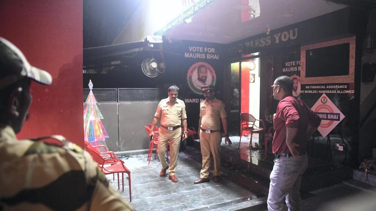 <div class="paragraphs"><p>Police personnel at the site where Shiv Sena (UBT) leader Vinod Ghosalkar's son Abhishek was shot, in Mumbai, Thursday, Feb. 8, 2024. Abhishek was shot dead during a Facebook live by local social activist Mauris Noronha, who also ended his life by shooting self, according to police.</p></div>
