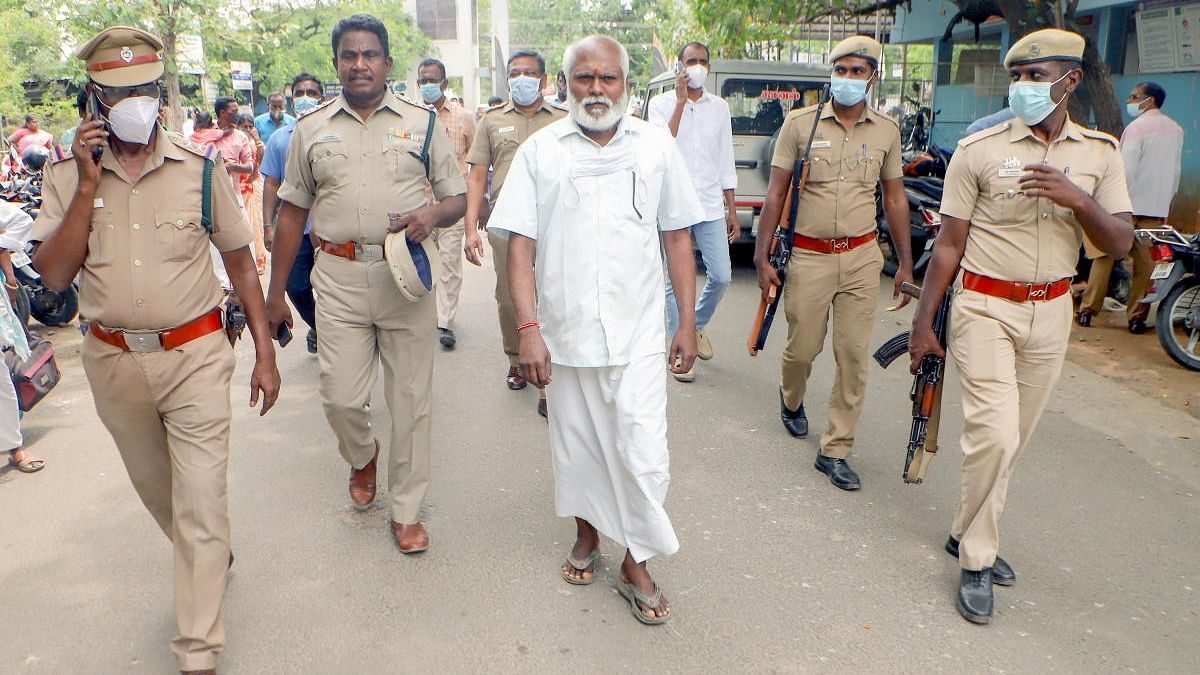 <div class="paragraphs"><p>In this file photo,&nbsp;Santhan, former prime minister Rajiv Gandhi assassination case convict is being taken to Vellore Government Medical College hospital for a general check-up.</p></div>