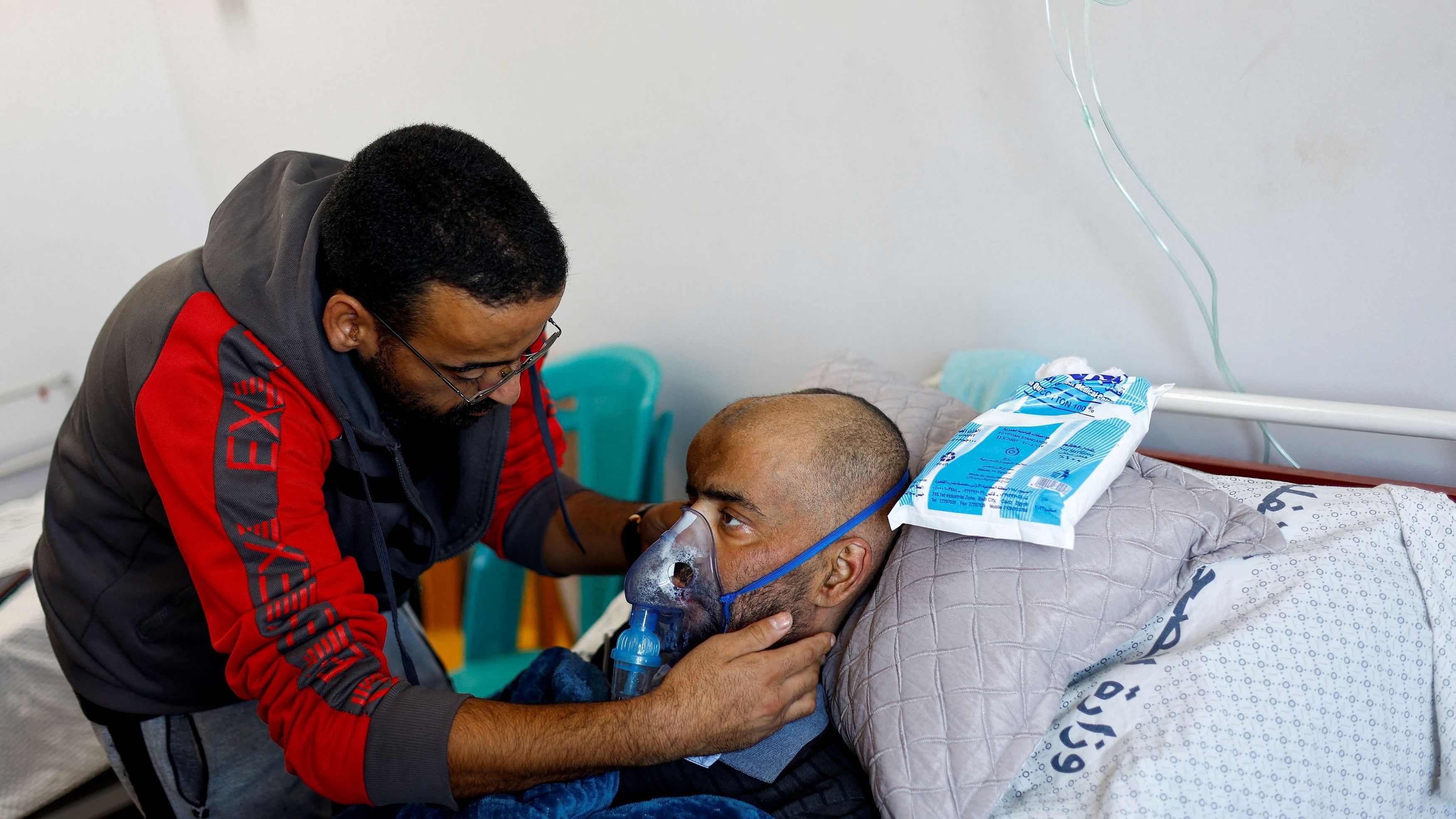 <div class="paragraphs"><p>A Palestinian cancer patient, who was evacuated from the Turkish-Palestinian Friendship hospital which had to shut down operation due to the ongoing Israeli ground offensive, is assisted at Nasser hospital in Khan Younis, in the southern Gaza Strip November 16, 2023. </p></div>