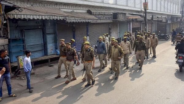 <div class="paragraphs"><p>Security personnel conduct a flag march during Varanasi bandh called by the Muslim community after a Varanasi court granted permission for puja in the 'Vyas ji ka Tehkhana' of the Gyanvapi Mosque, in Varanasi, Friday, February 2, 2024.</p></div>