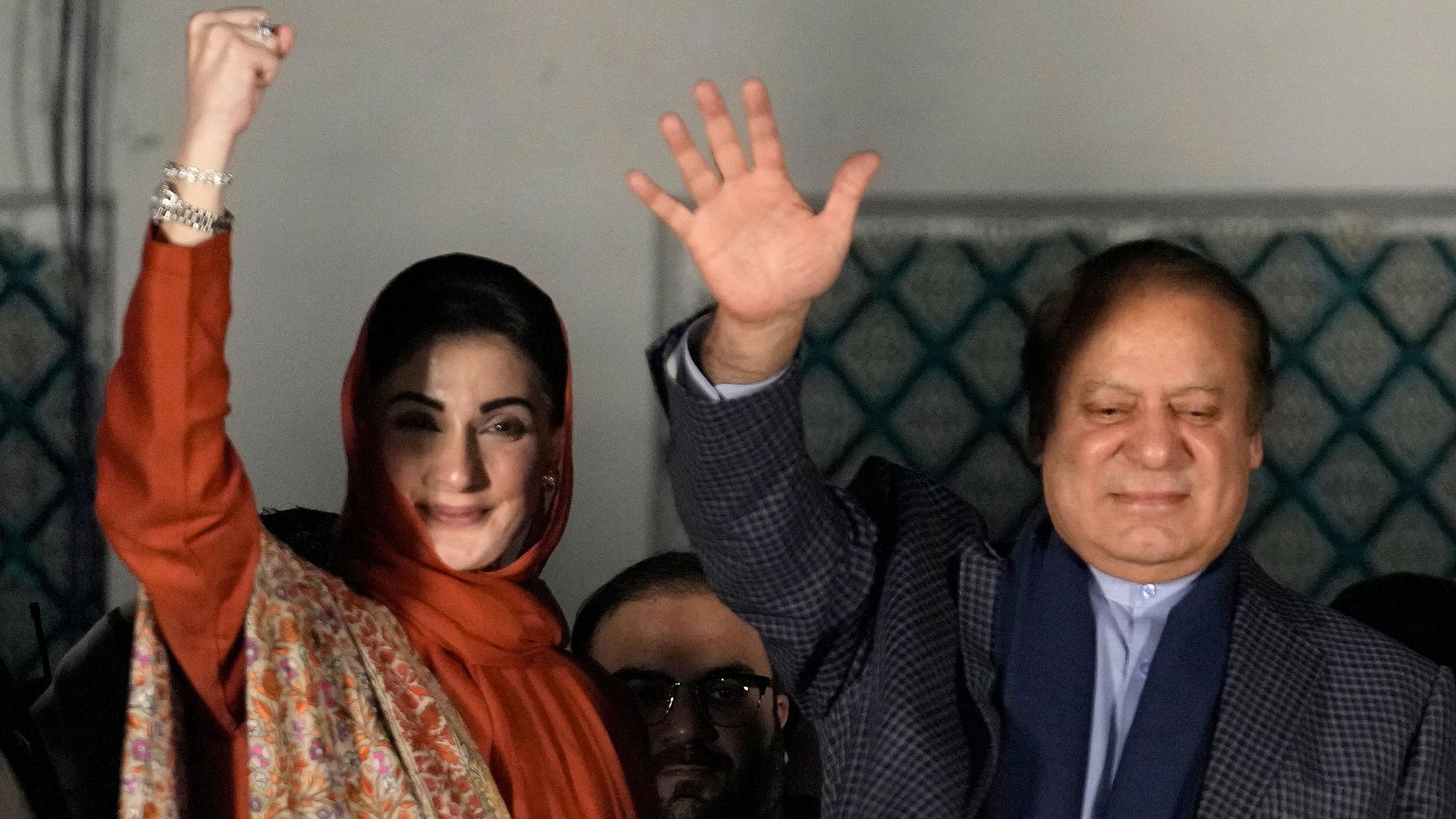 <div class="paragraphs"><p>Former Prime Minister Nawaz Sharif, right,  and daughter Maryam Nawaz, wave to supporters following initial results of the country's parliamentary election, in Lahore, Pakistan, Friday, Feb 9.</p></div>