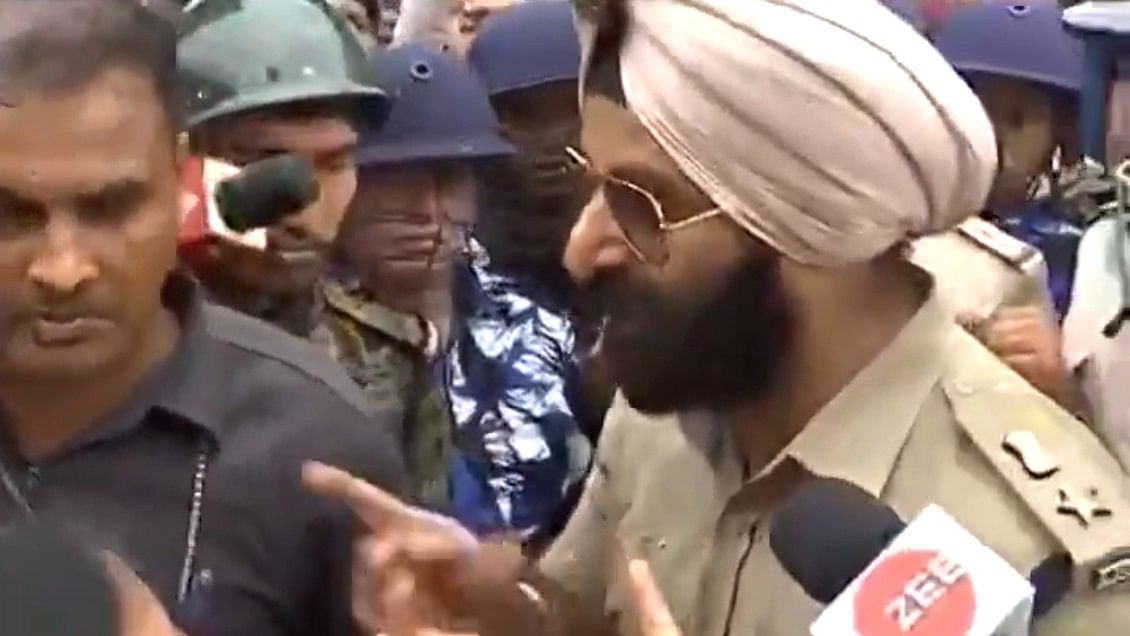 <div class="paragraphs"><p>A screen grab from the video shows IPS officer&nbsp;Jaspreet Singh engaged in a heated argument with BJP MLAs in Sandeshkhali of West Bengal’s North 24 Parganas district on Tuesday.</p></div>