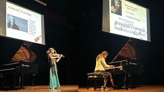 Alisha Govindaraj on the violin and Aria Knechtges on the piano.   