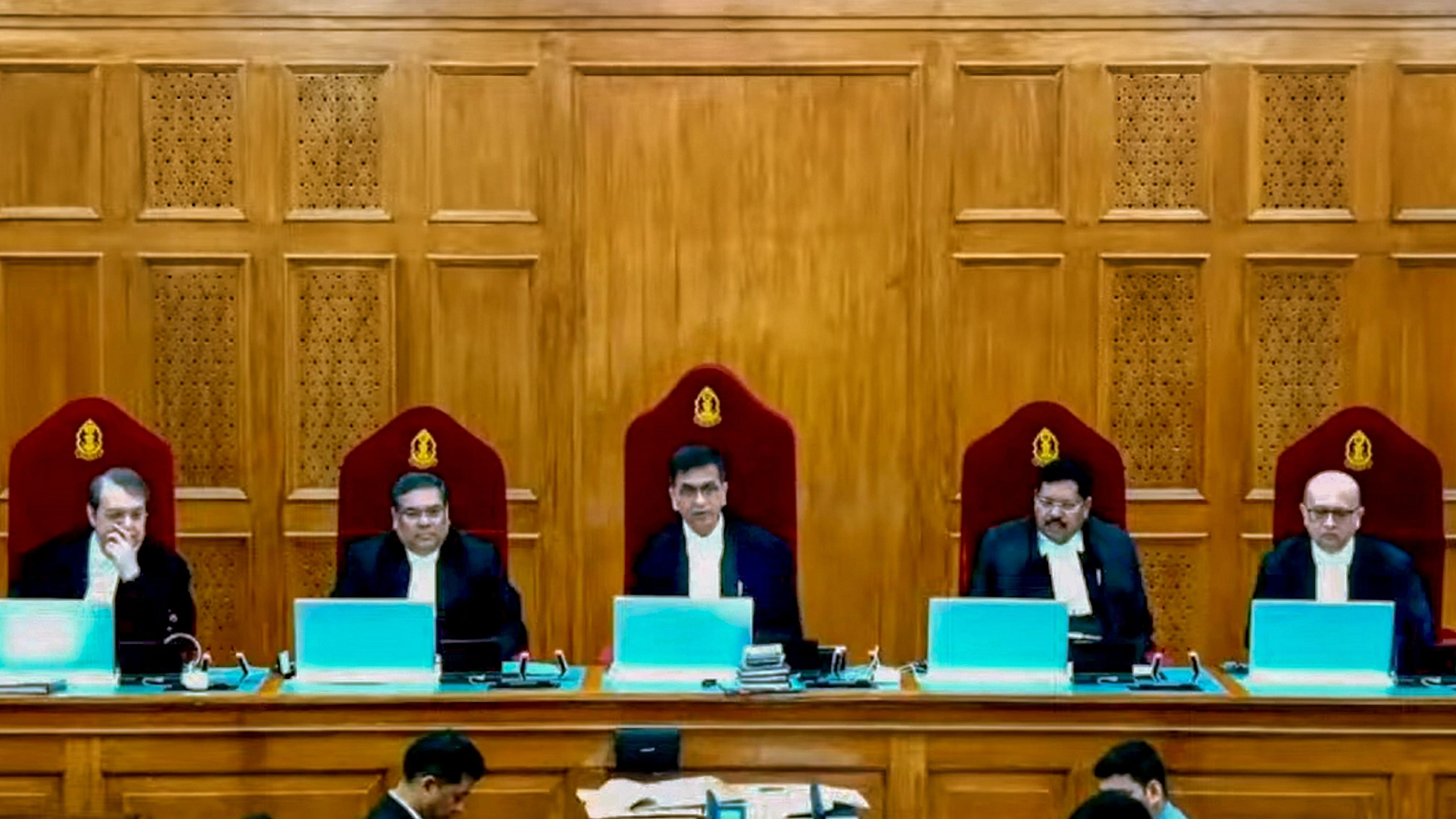 <div class="paragraphs"><p>The five-judge bench headed by Chief Justice of India Dr D.Y. Chandrachud and comprising Justices Sanjiv Khanna, B.R. Gavai, J.B. Pardiwala and Manoj Mishra during pronouncement of verdict on electoral bond scheme on Thursday.</p></div>