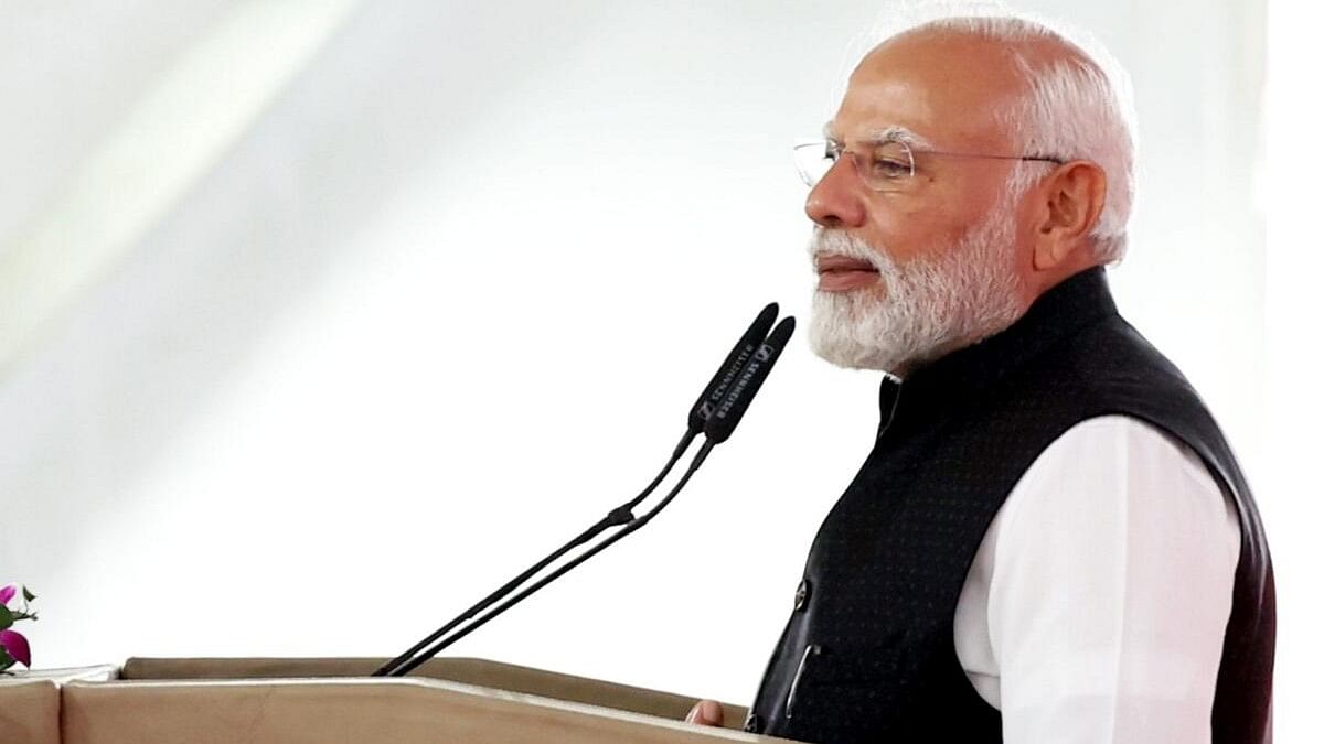 <div class="paragraphs"><p>Prime Minister Narendra Modi addresses during a public event, in Navsari, Gujarat</p></div>