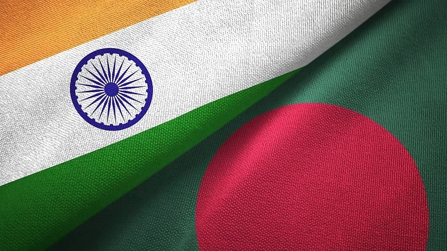 <div class="paragraphs"><p>Flags of India and Bangladesh.</p></div>