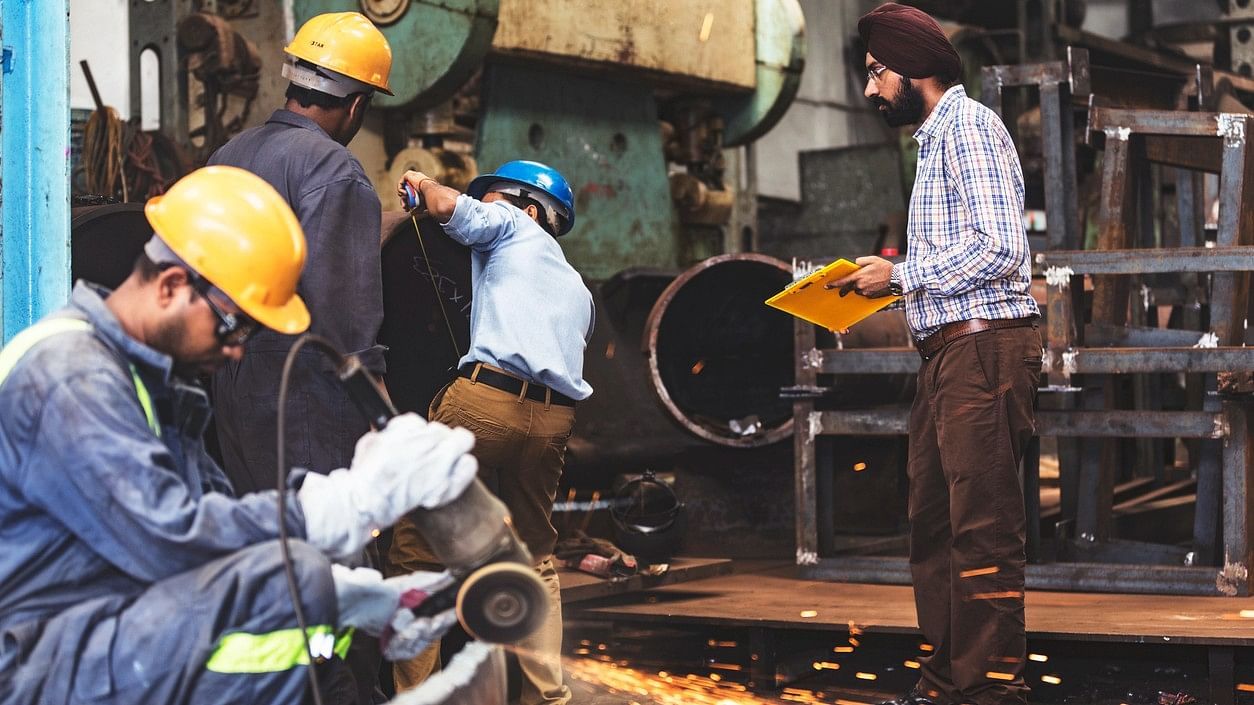 <div class="paragraphs"><p>representative image showing workers in a factory</p></div>