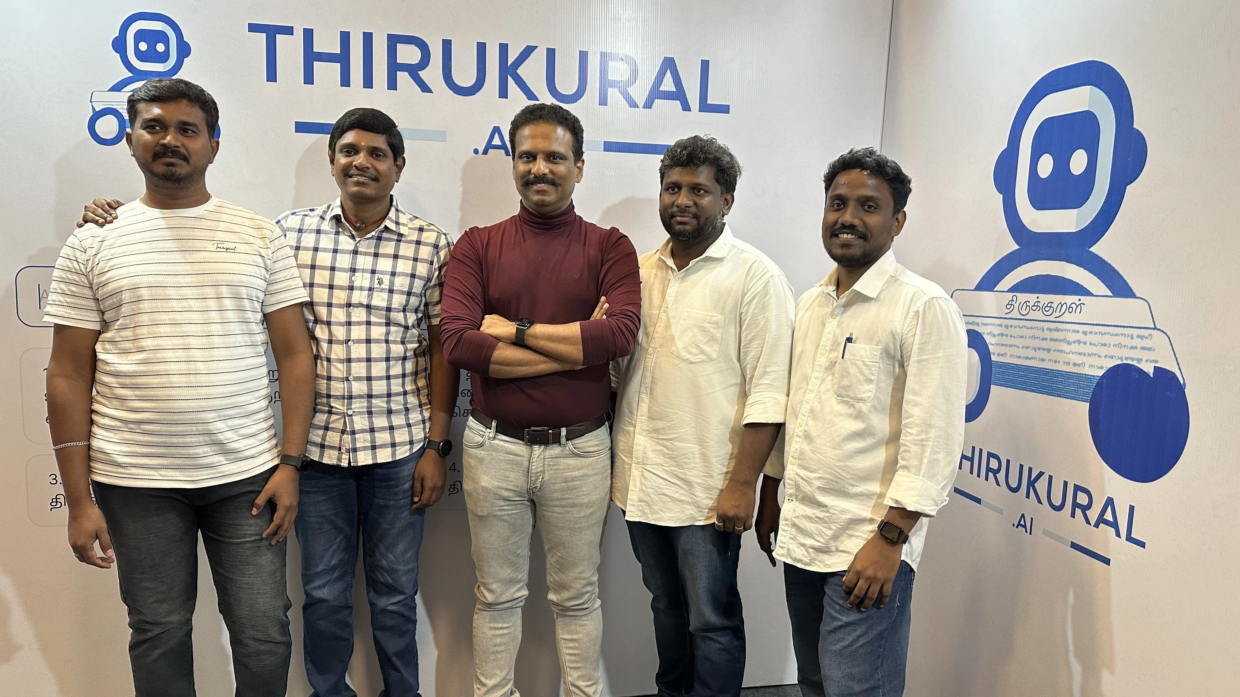 <div class="paragraphs"><p>Suresh Sambandam (centre) with the team which developed Thirukural.ai software.</p></div>