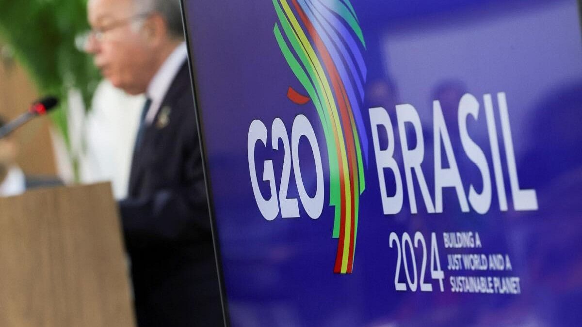 <div class="paragraphs"><p>A logo of G20 is displayed as Brazilian Foreign Minister Mauro Vieira speaks during a press conference following the G20 Foreign Ministers' Meeting, in Rio de Janeiro.&nbsp;</p></div>