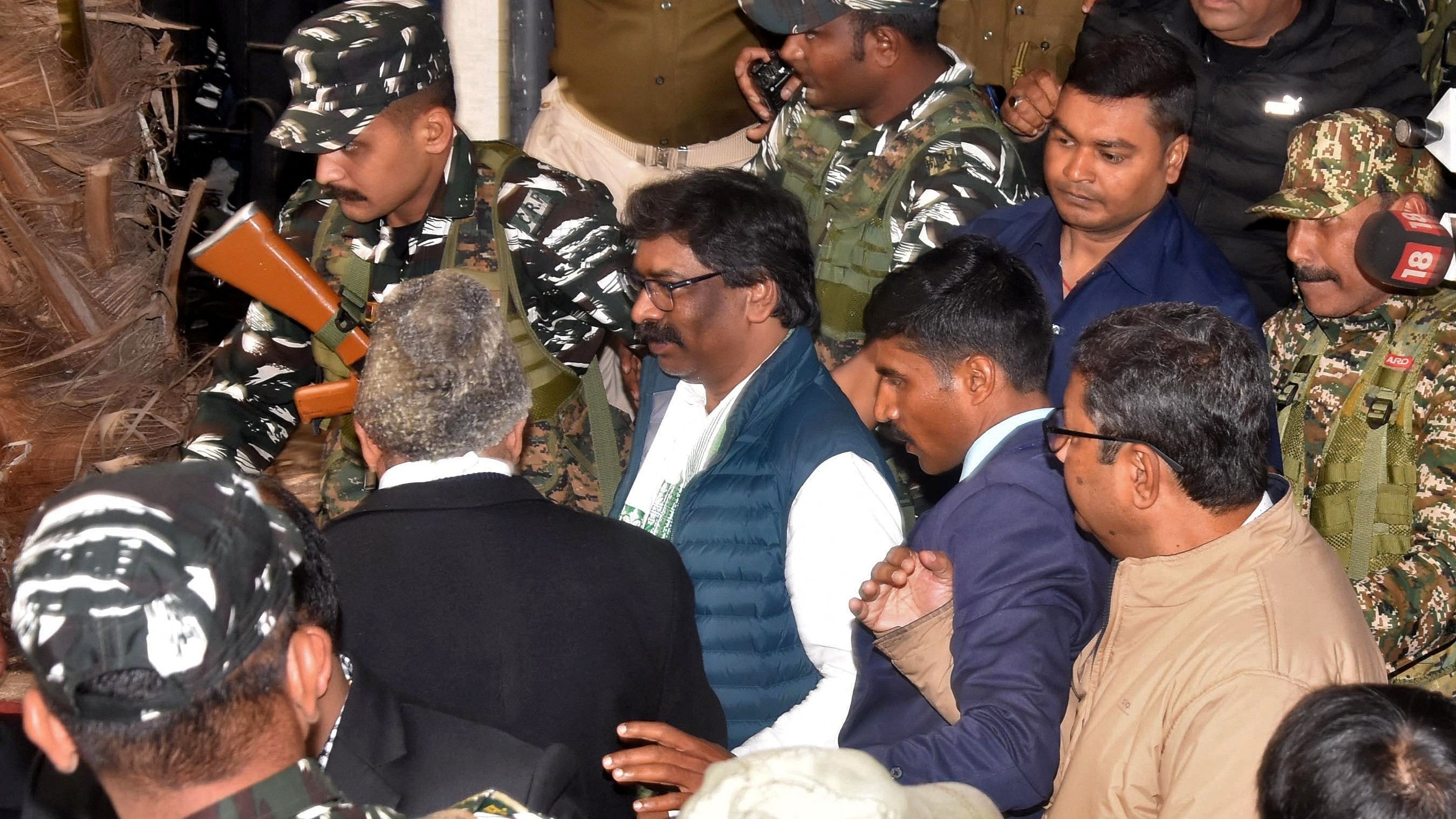 <div class="paragraphs"><p>Hemant Soren, former chief minister of  Jharkhand, is escorted by security personnel as he leaves court following his arrest late Wednesday.</p></div>