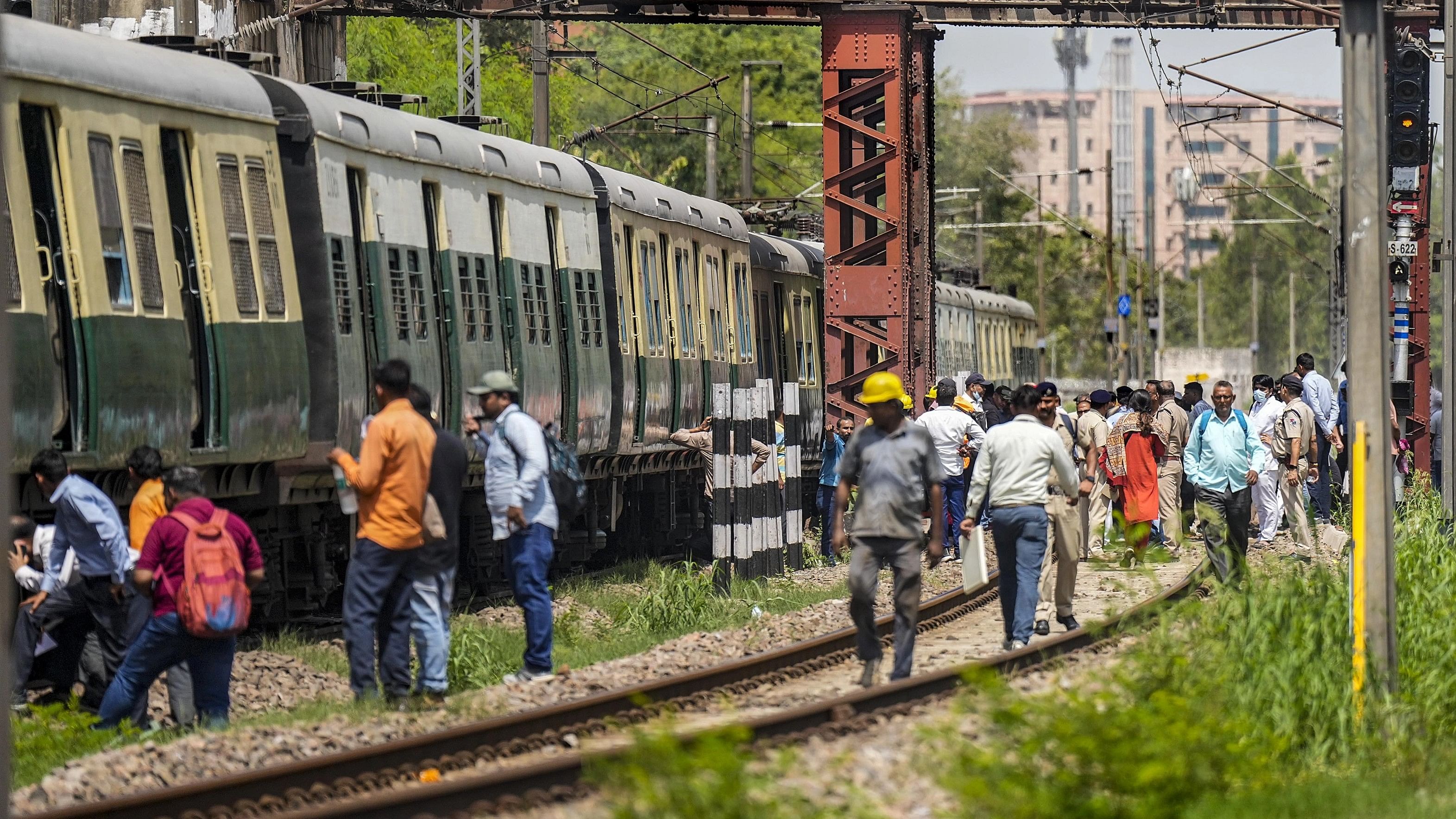 <div class="paragraphs"><p>Passengers outside a train. Image for representation only.</p></div>