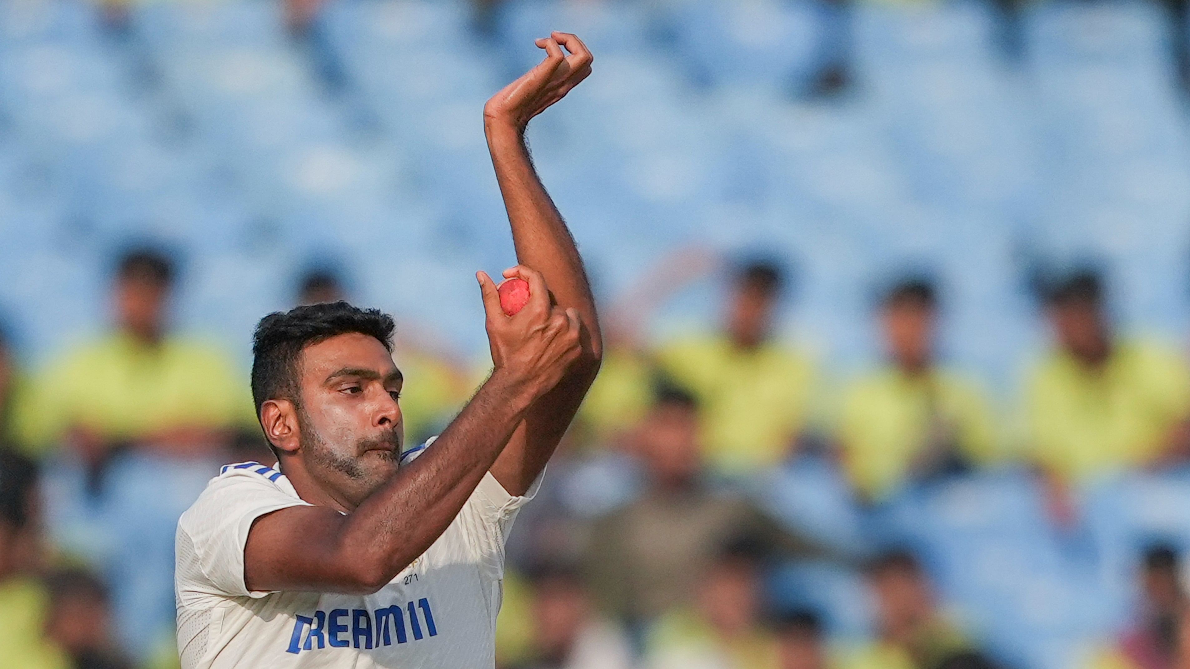 <div class="paragraphs"><p>File Photo: Ravichandran Ashwin bowls on day two of the 3rd Cricket Test Match between India and England, at Niranjan Shah Stadium, in Rajkot, Friday, Feb 16, 2024.</p></div>