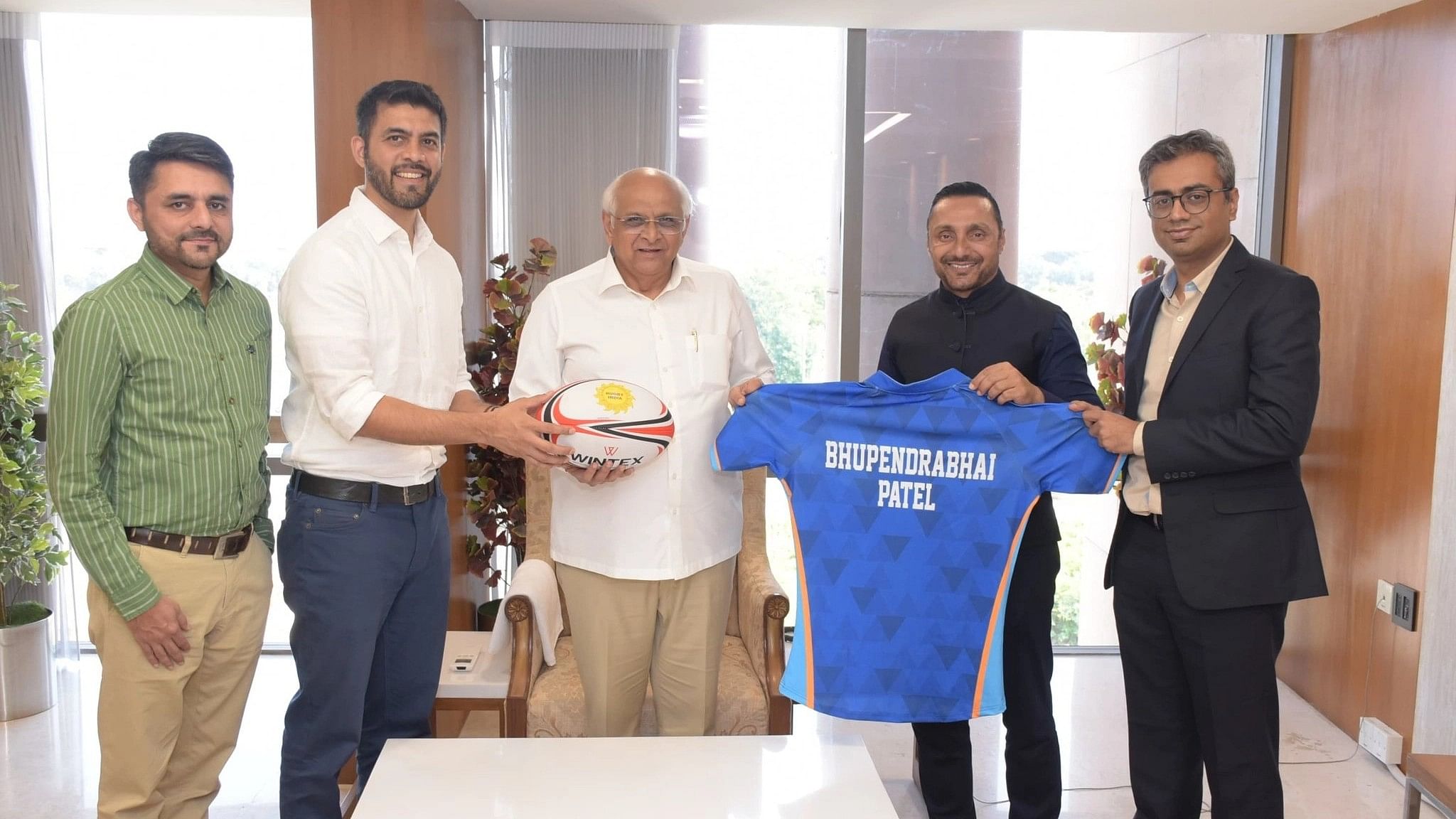 <div class="paragraphs"><p>IRFU President Rahul Bose and Gujarat CM&nbsp;Bhupendra Patel </p></div>