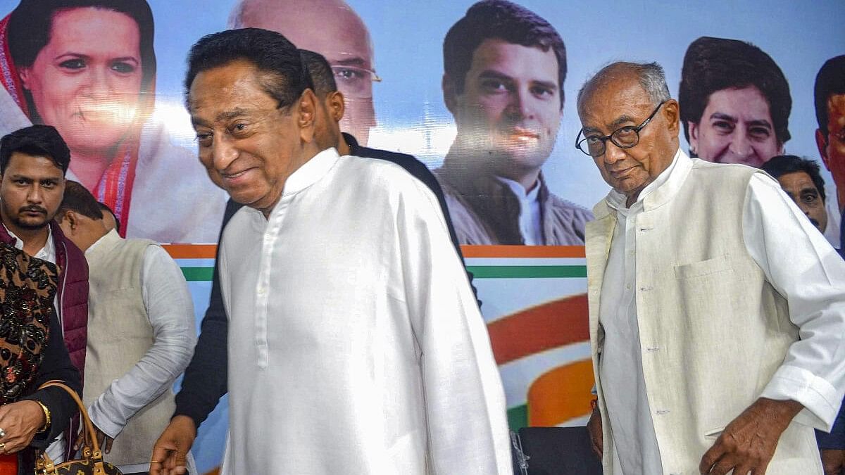 <div class="paragraphs"><p>File photo of Kamal Nath with party leader Digvijaya Singh.&nbsp;</p></div>