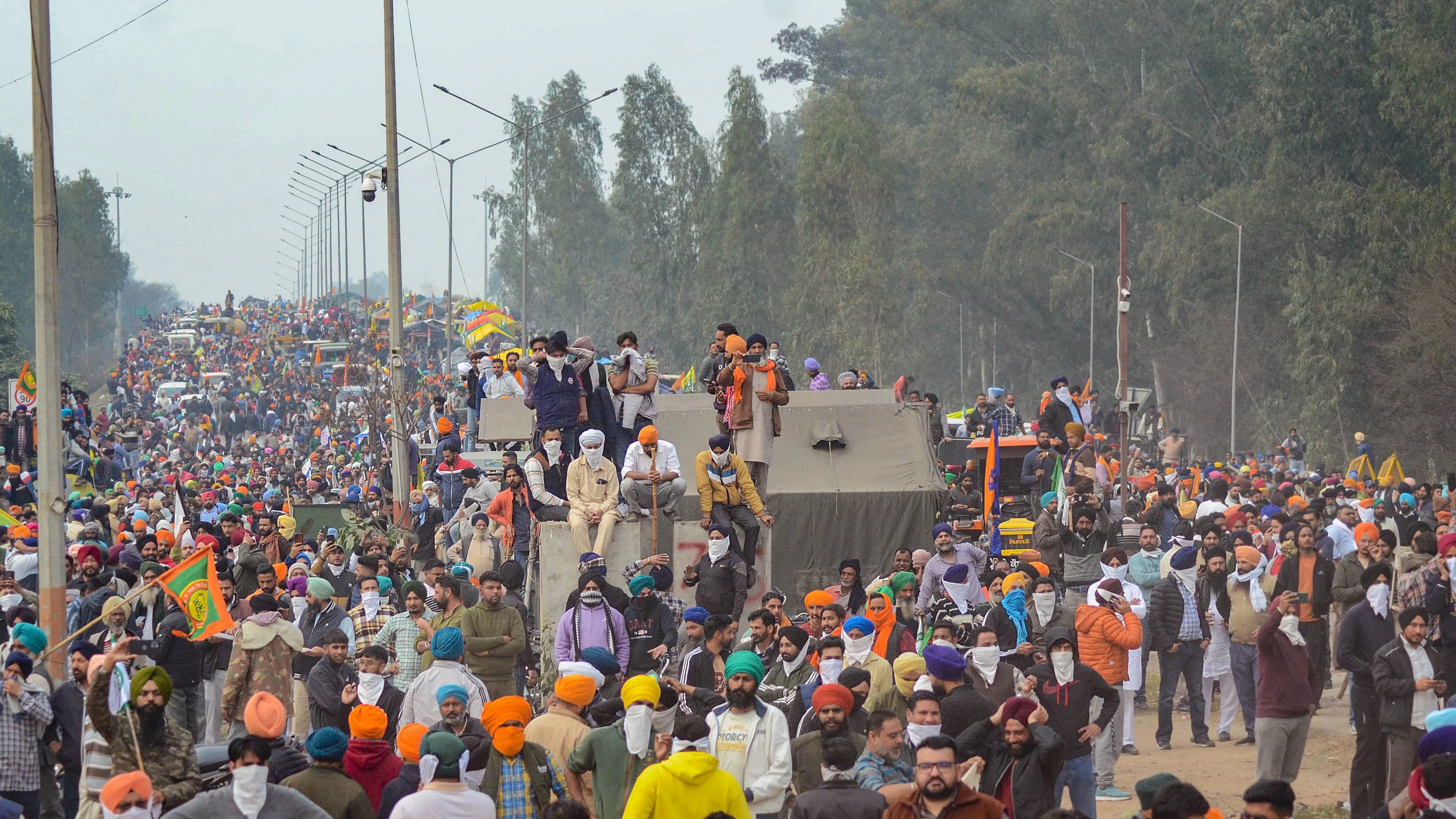 <div class="paragraphs"><p> Farmers gather near Punjab-Haryana Shambhu border during their 'Delhi Chalo' march, near Patiala, Tuesday, Feb 13, 2024. </p></div>