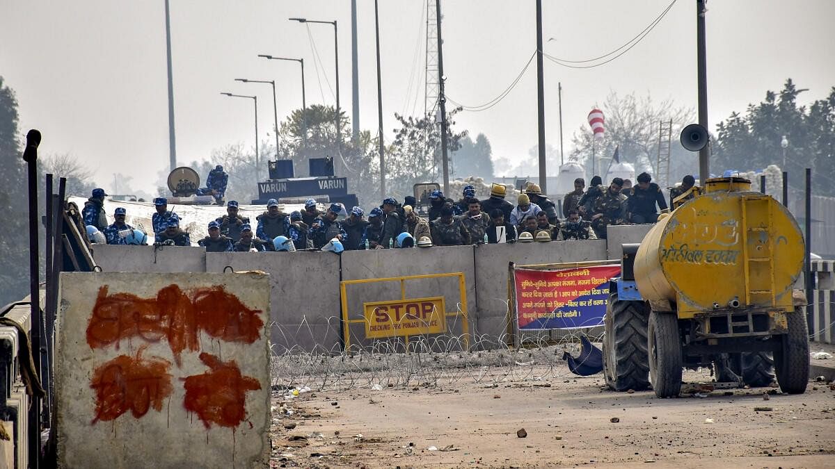 <div class="paragraphs"><p>Security personnel guard at the Punjab-Haryana Shambhu border farmers' 'Delhi Chalo' protest, near Patiala.&nbsp;</p></div>