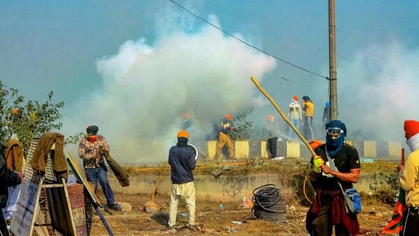 <div class="paragraphs"><p>Farmers retaliate with water after police used tear gas to disperse them during their 'Delhi Chalo' march, at the Punjab-Haryana Shambhu border in Patiala district.</p></div>