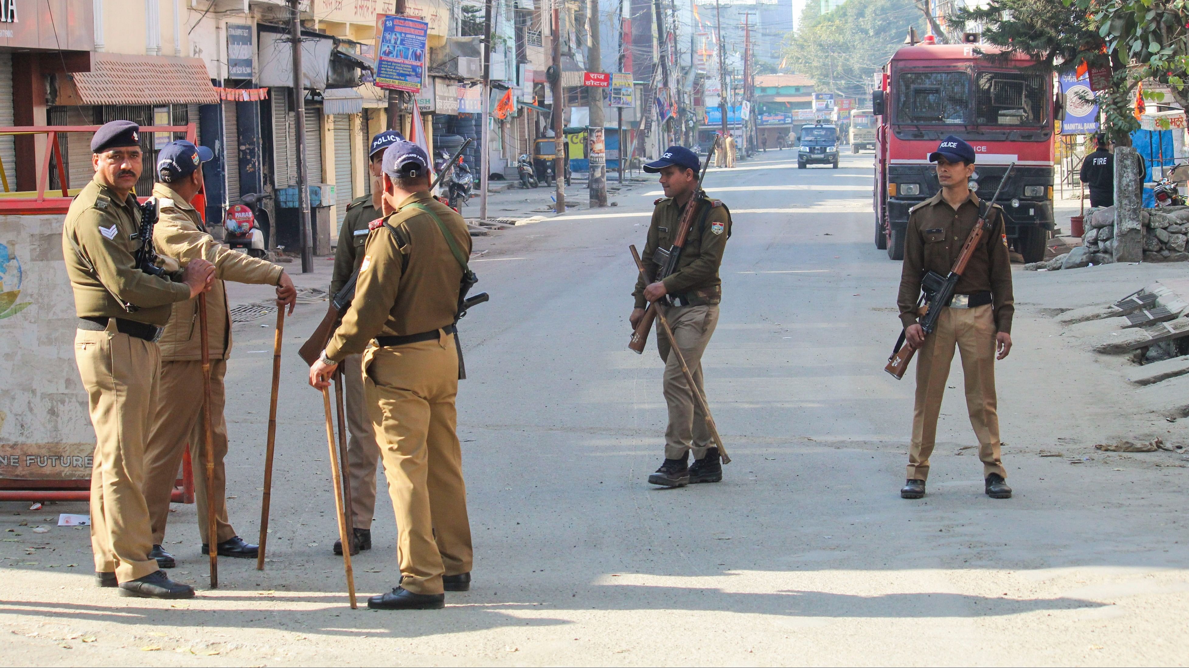 <div class="paragraphs"><p>A file photo of police personnel standing guard in Haldwani.</p></div>
