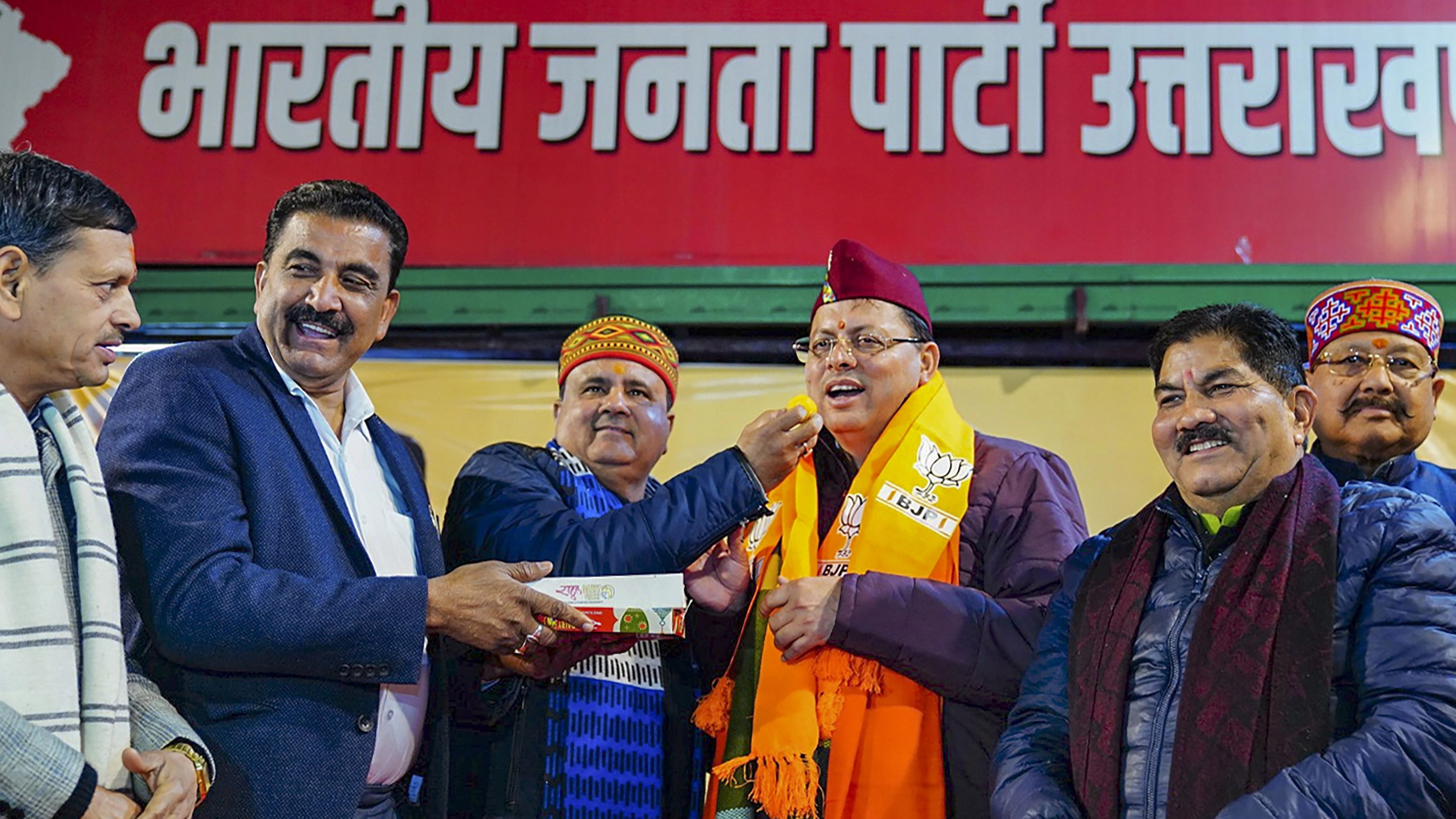 <div class="paragraphs"><p>Uttarakhand Chief Minister Pushkar Singh Dhami being greeted by BJP leaders after the state Assembly passed the Uniform Civil Code Bill, at the party office, in Dehradun.</p></div>