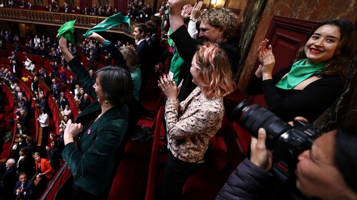 <div class="paragraphs"><p>MPs and senators react after President of the National Assembly Yael Braun-Pivet announced the result of the vote during the convocation of a congress of both houses of parliament in Versailles, southwestern of Paris, France March 4, 2024, to anchor the right to abortion in the country's constitution.</p></div>