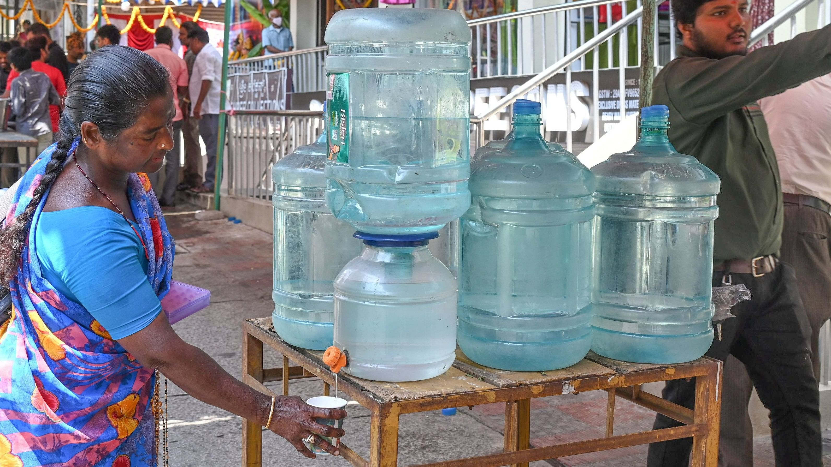 <div class="paragraphs"><p>Shop owners in Malleswaram keep water cans outside their shops, offering free drinking water to the public to combat the heat. </p></div>