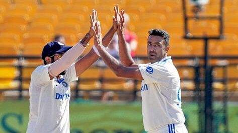 <div class="paragraphs"><p>India's Ravichandran Ashwin with teammate celebrates the wicket of England's Zak Crawley during the 3rd day of the fifth Test cricket match between India and England, in Dharamsala, Satutday, March 9, 2024.</p></div>