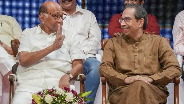 <div class="paragraphs"><p>NCP (SP) leader Sharad Pawar along with Shiv Sena (UBT) chief Uddhav Thackeray.</p></div>