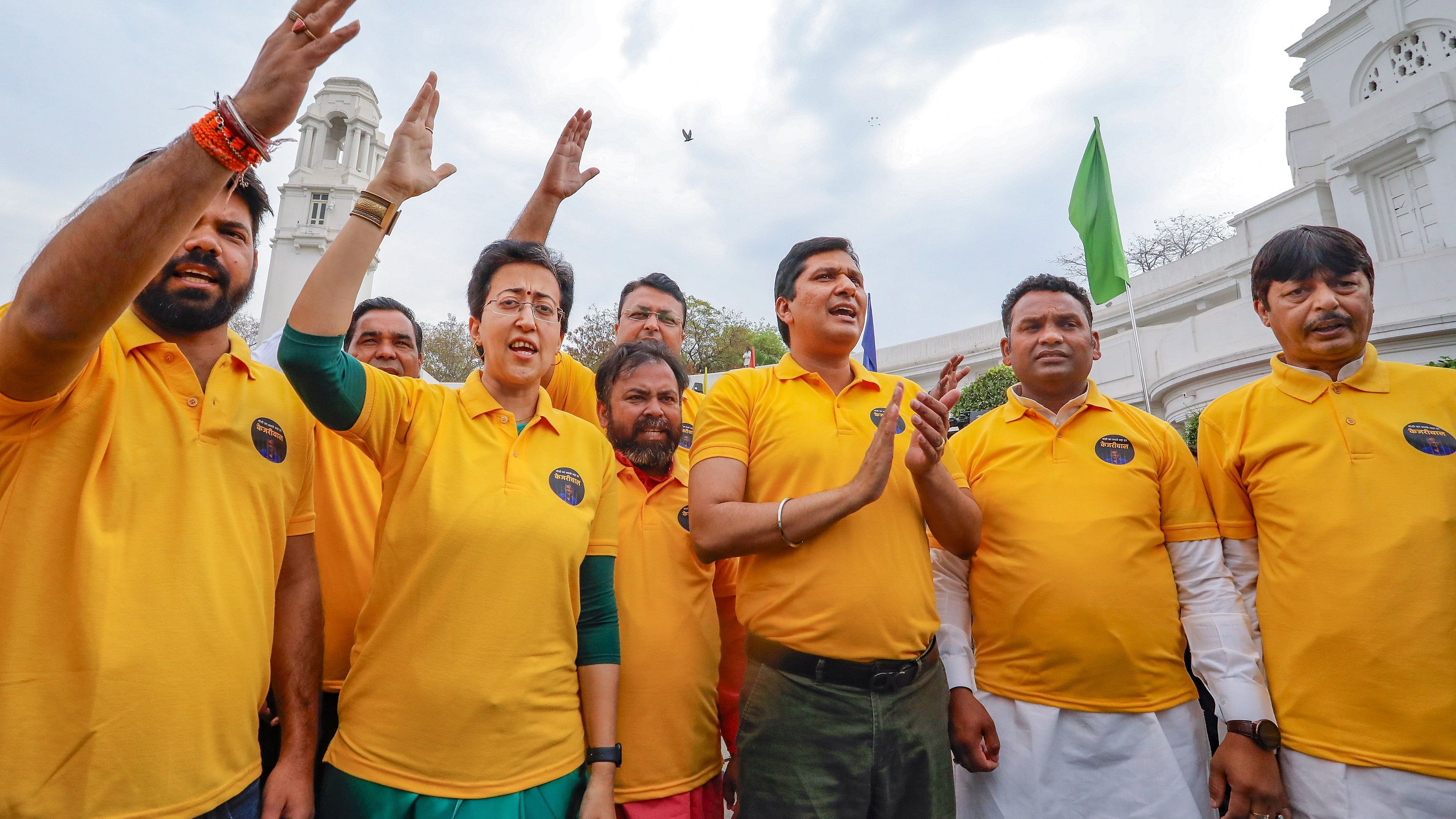 <div class="paragraphs"><p>Delhi Ministers Atishi and Saurabh Bharadwaj with AAP MLAs protest at the Delhi Legislative Assembly against the arrest of Chief Minister Arvind Kejriwal, in New Delhi, Wednesday on March 27, 2024.</p></div>