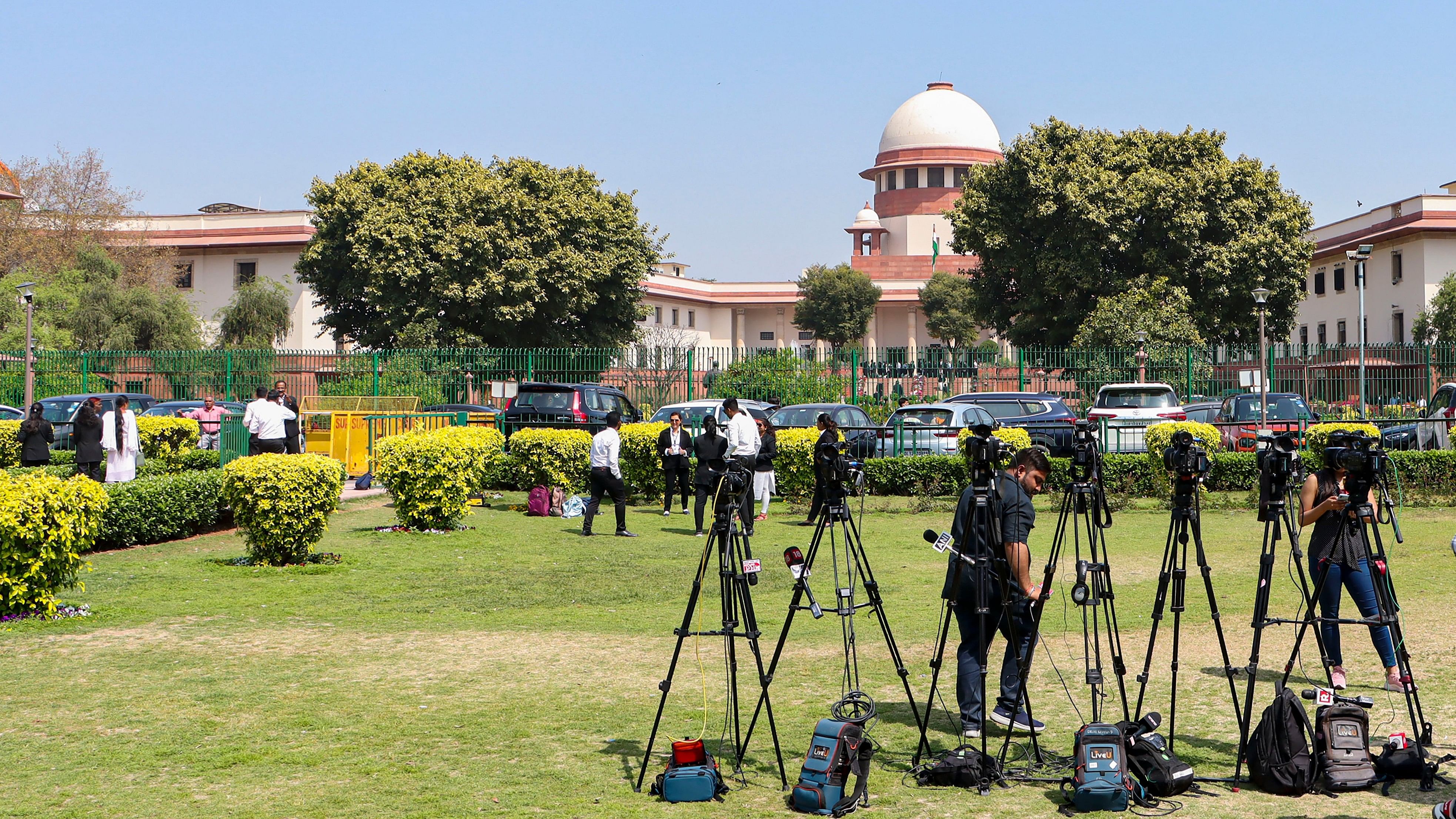 <div class="paragraphs"><p>New Delhi: Cameras installed by media personnel outside the Supreme Court of India during a hearing on electoral bonds case, in New Delhi on Monday.&nbsp;</p></div>