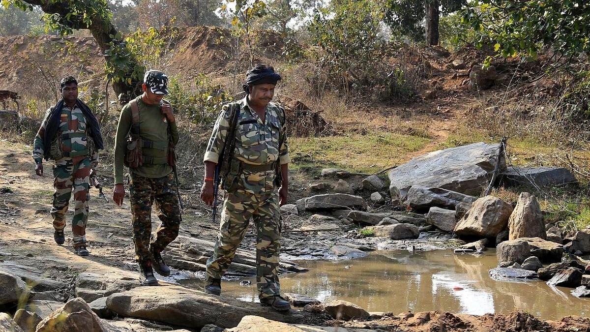 <div class="paragraphs"><p>CRPF jawans in dense forest areas during a search operation against Maoists at Latehar district of Jharkhand.</p></div>