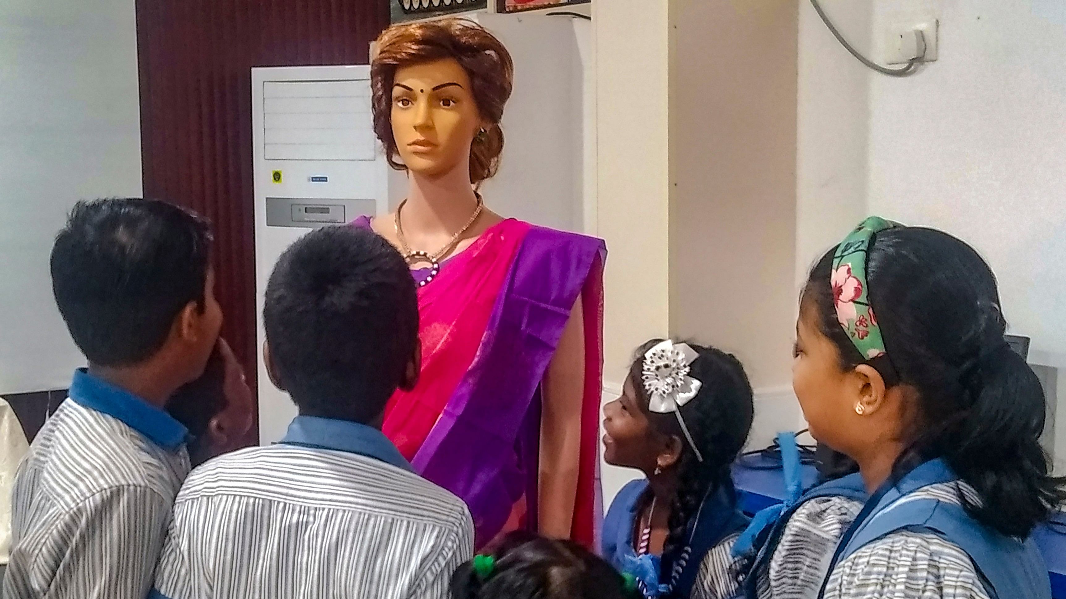 <div class="paragraphs"><p>India's first AI teacher 'Iris' interacts with students at a school, at Attingal, in Thiruvananthapuram.</p></div>