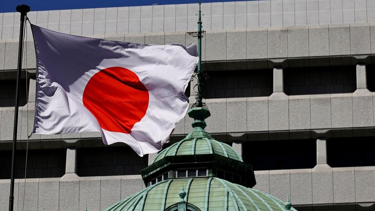 <div class="paragraphs"><p>Japanese national flag waves at the Bank of Japan building in Tokyo.</p></div>