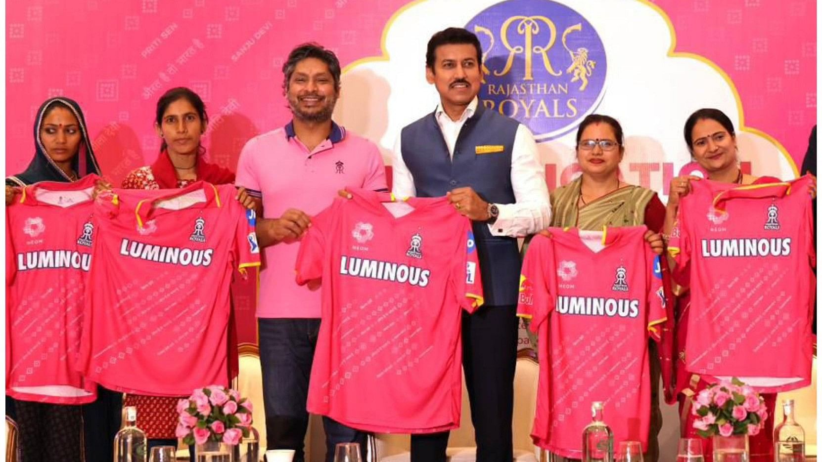 <div class="paragraphs"><p>Former Sri Lankan cricketer Kumara Sangakara with BJP Minister Colonel Rajyavardhan Rathore and others during the launch of Rajasthan Royals' pink jersey on March 12, 2024.</p></div>