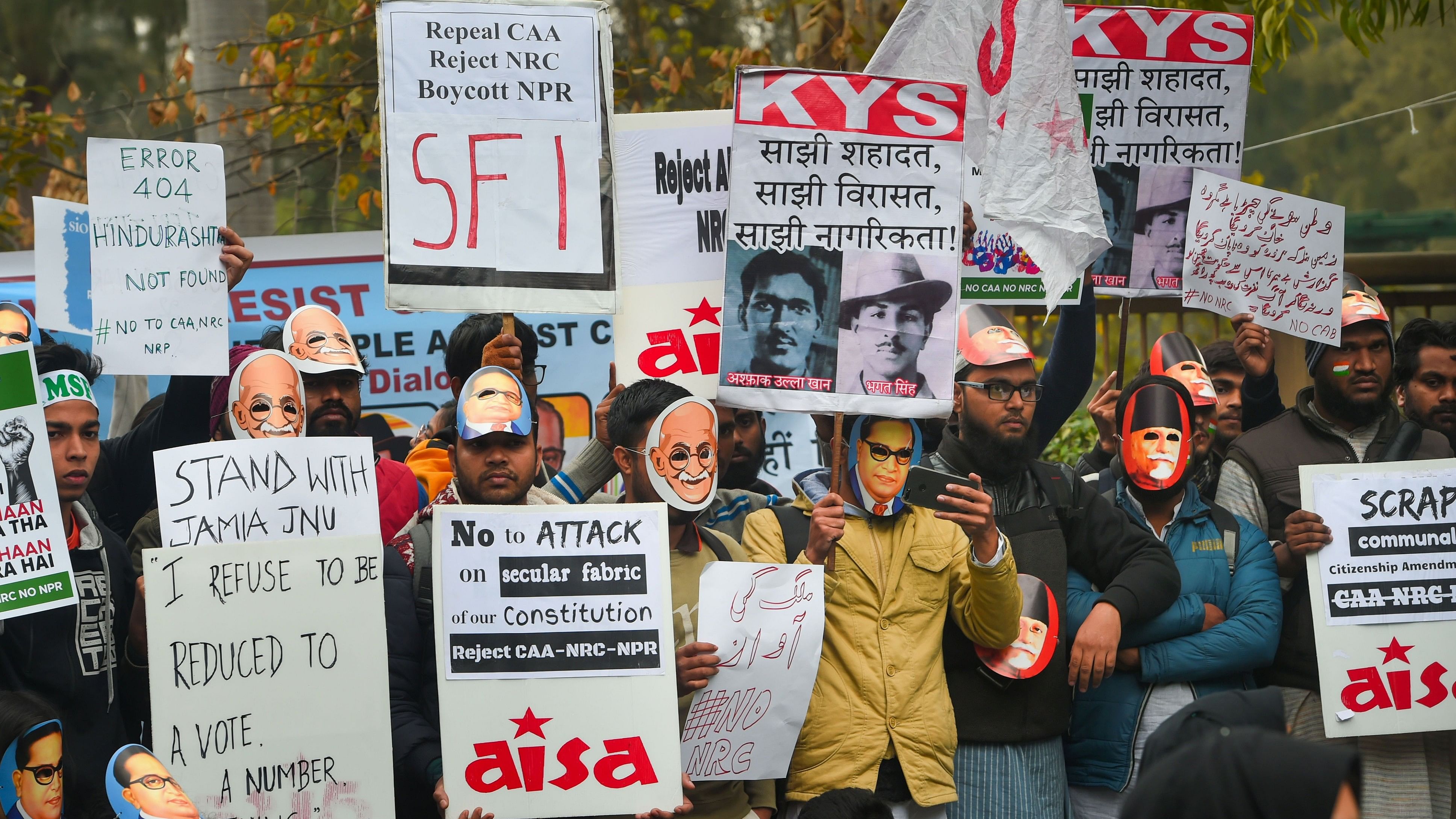 <div class="paragraphs"><p>Students display posters and placards during a protest against CAA and NRC at Delhi University's North Campus. </p></div>