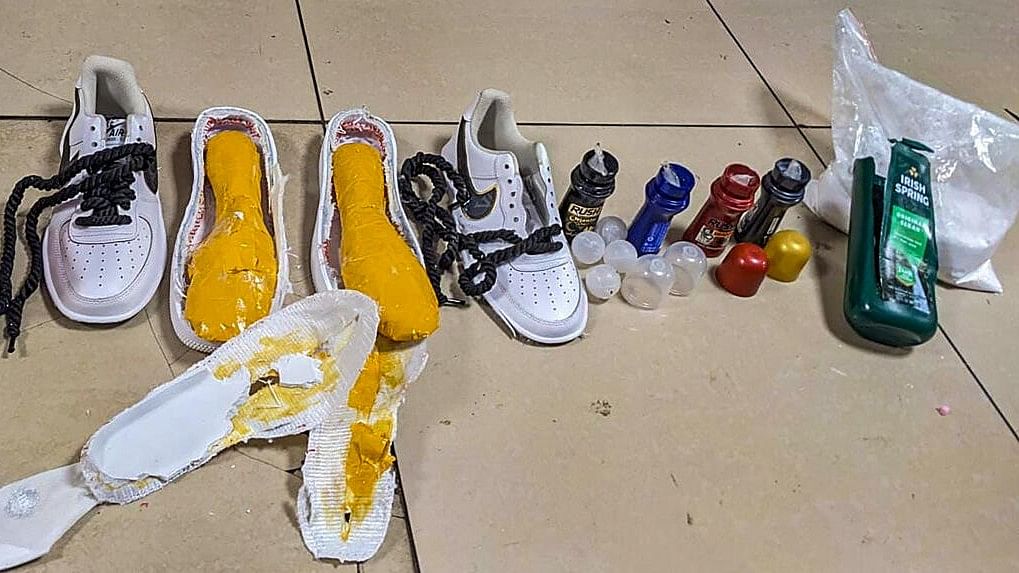 <div class="paragraphs"><p>Directorate of Revenue Intelligence (DRI) officials display items which were used to conceal cocaine after they were seized from a woman at Mumbai airport.</p></div>